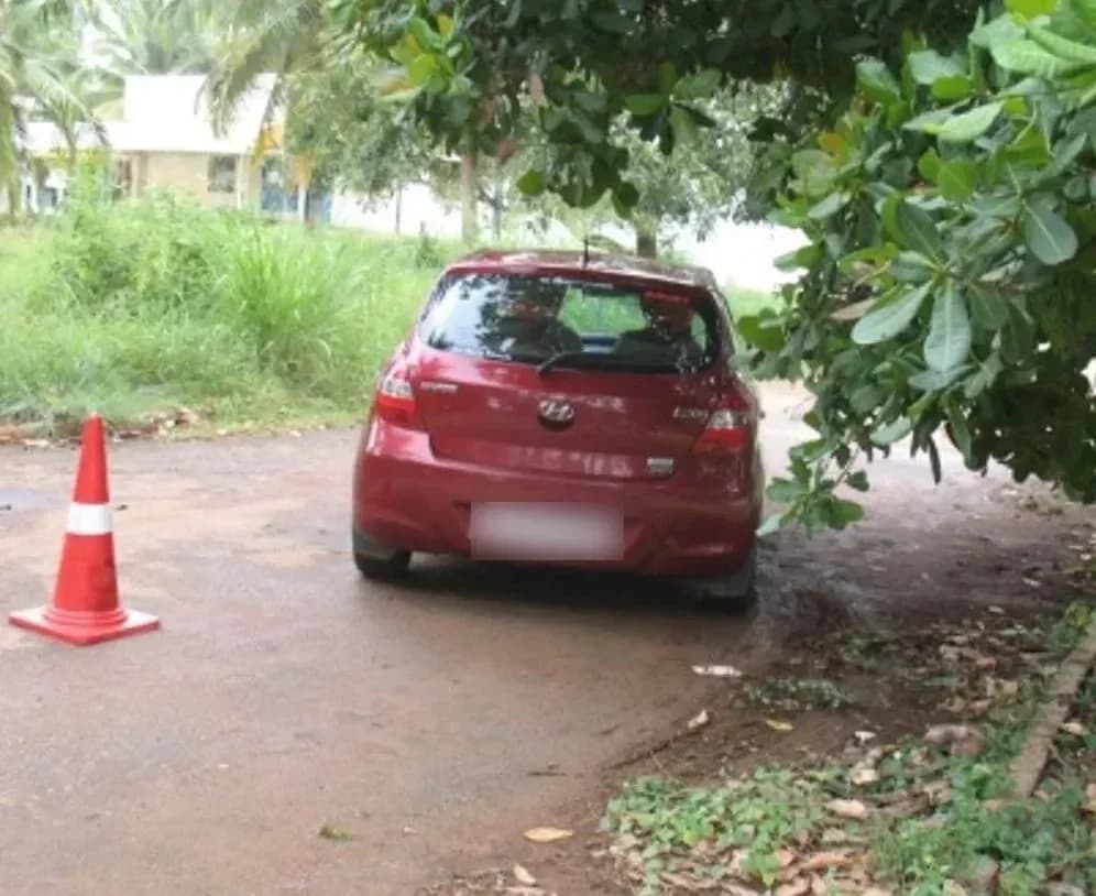 Red hatchback cone course
